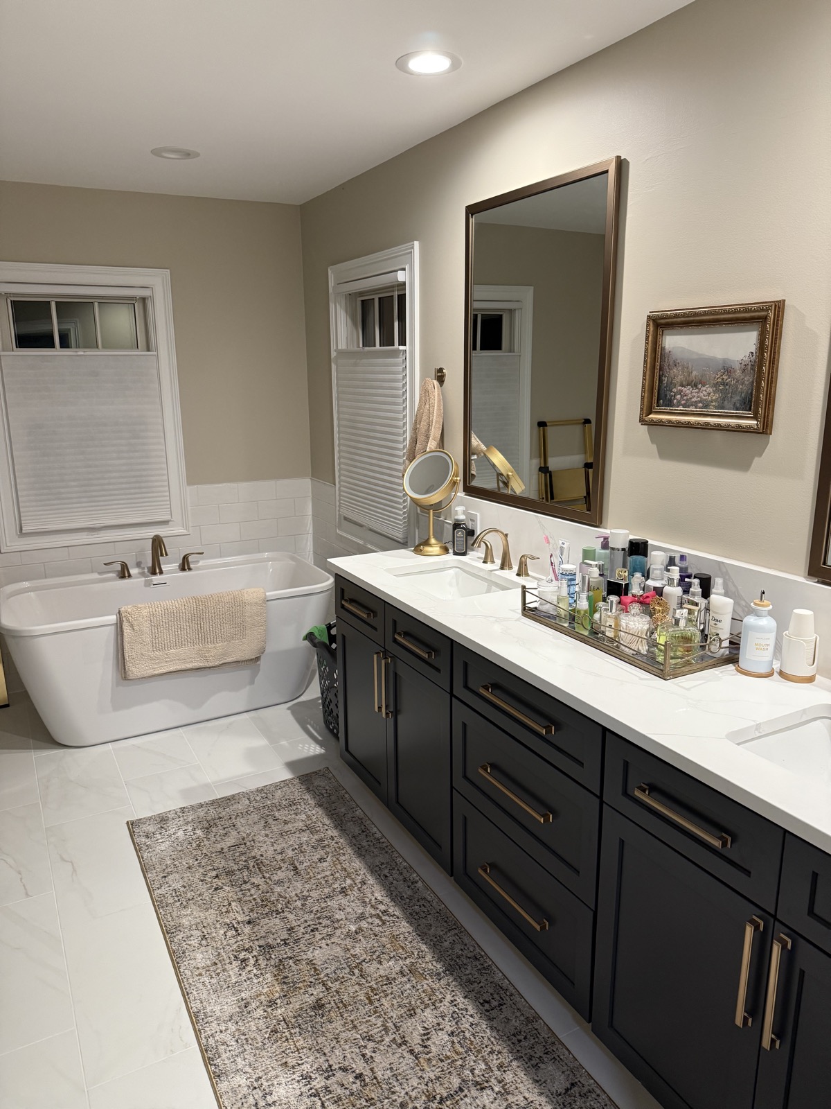 Spa-inspired bathroom with sculptural freestanding soaking tub by QKC, Lake Geneva luxury remodeling