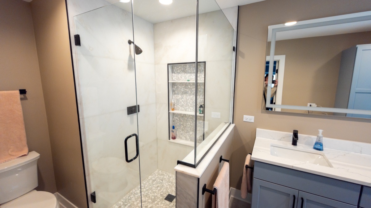 Designer bathroom vanity with elegant countertops and fixtures by QKC, Wisconsin custom home builder