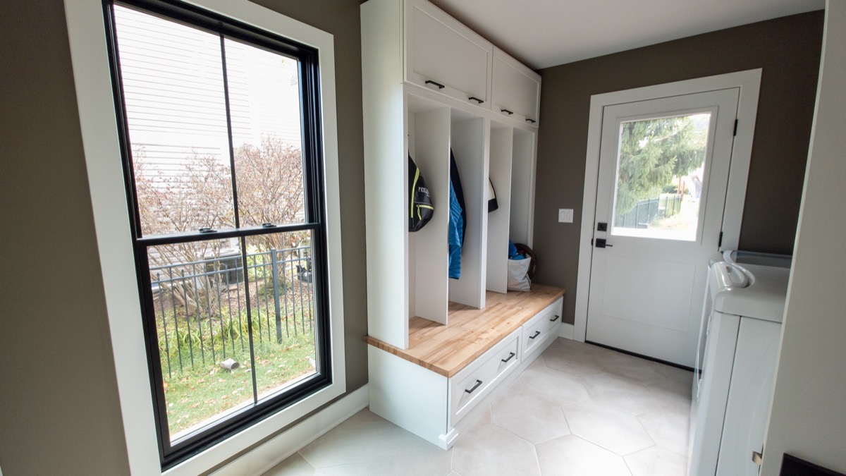 Bespoke mudroom with custom built-in storage and bench seating by QKC, Lake Geneva luxury builder